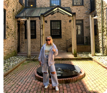 Person in Front of Building